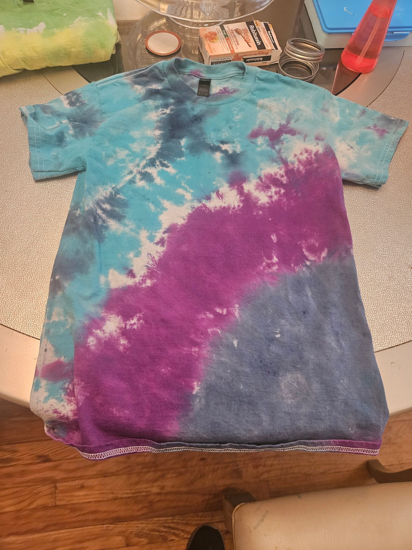 Tie dye t-shirt color and design will vary