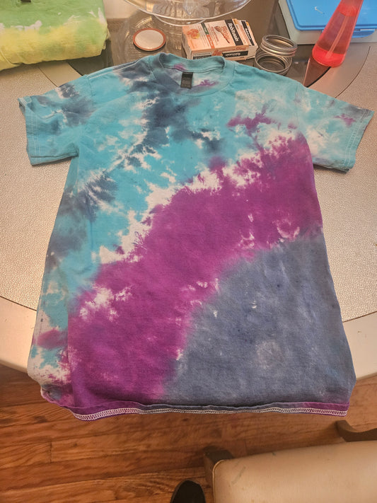 Tie dye t-shirt color and design will vary