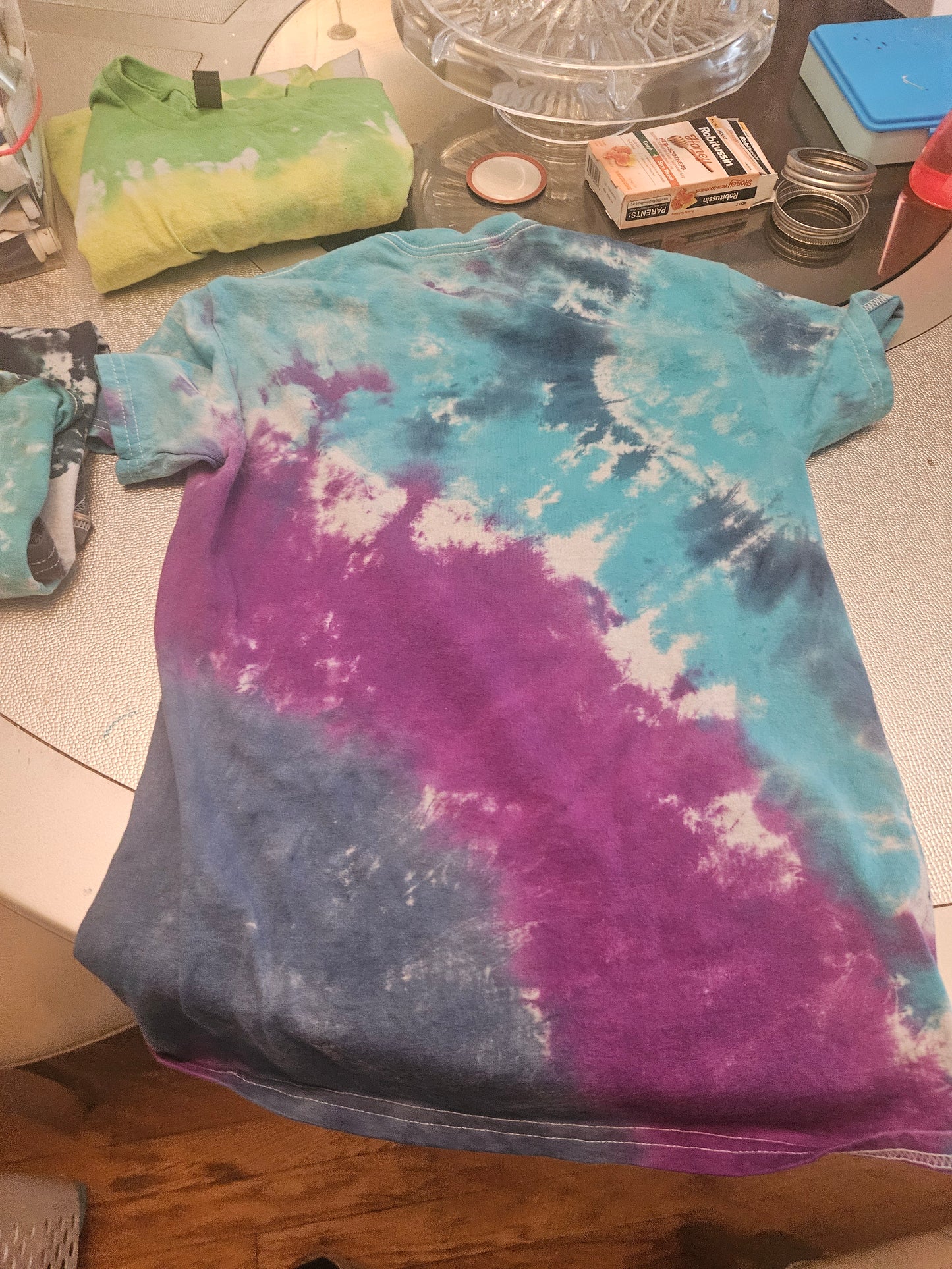 Tie dye t-shirt color and design will vary